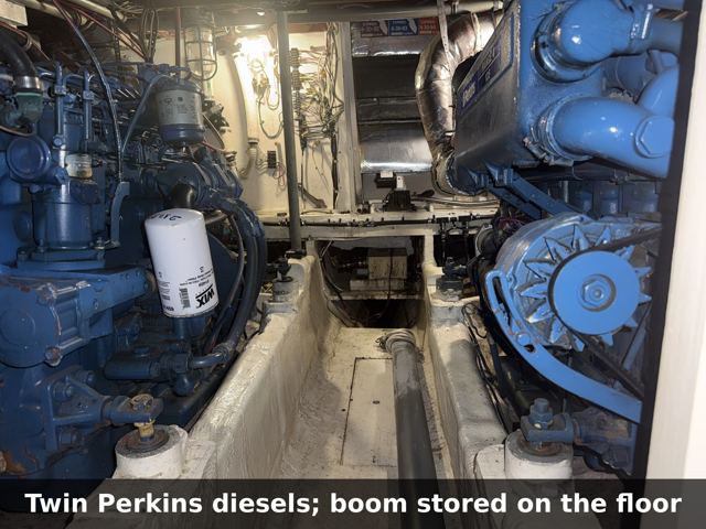 Twin Perkins diesels; boom stored on the floor